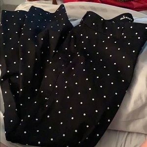 Black capris with white polka dots